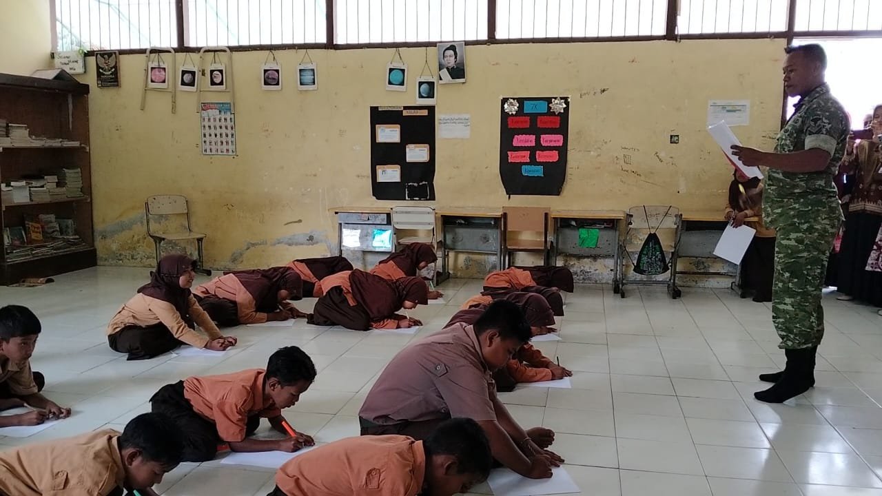 Siswa SD Negeri 4 Pasie Raya Adu Cerdas Cermat, Serka Syamsul H Dampingi